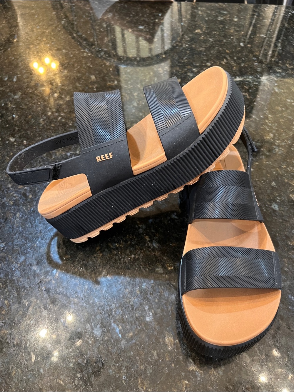 Reef Women’s Black and Tan Platform Slide Sandals